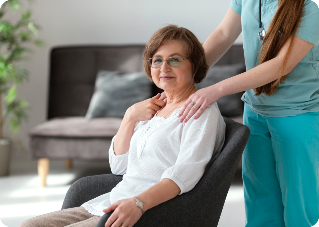 Nurse touching a womens shoulders for comfort