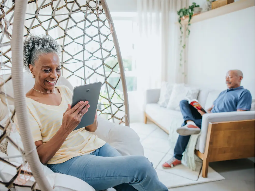 Women on tablet smiling